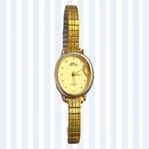 Vintage Felice Quartz Ladies Watch – Gold Tone Stretch Band – Needs Battery